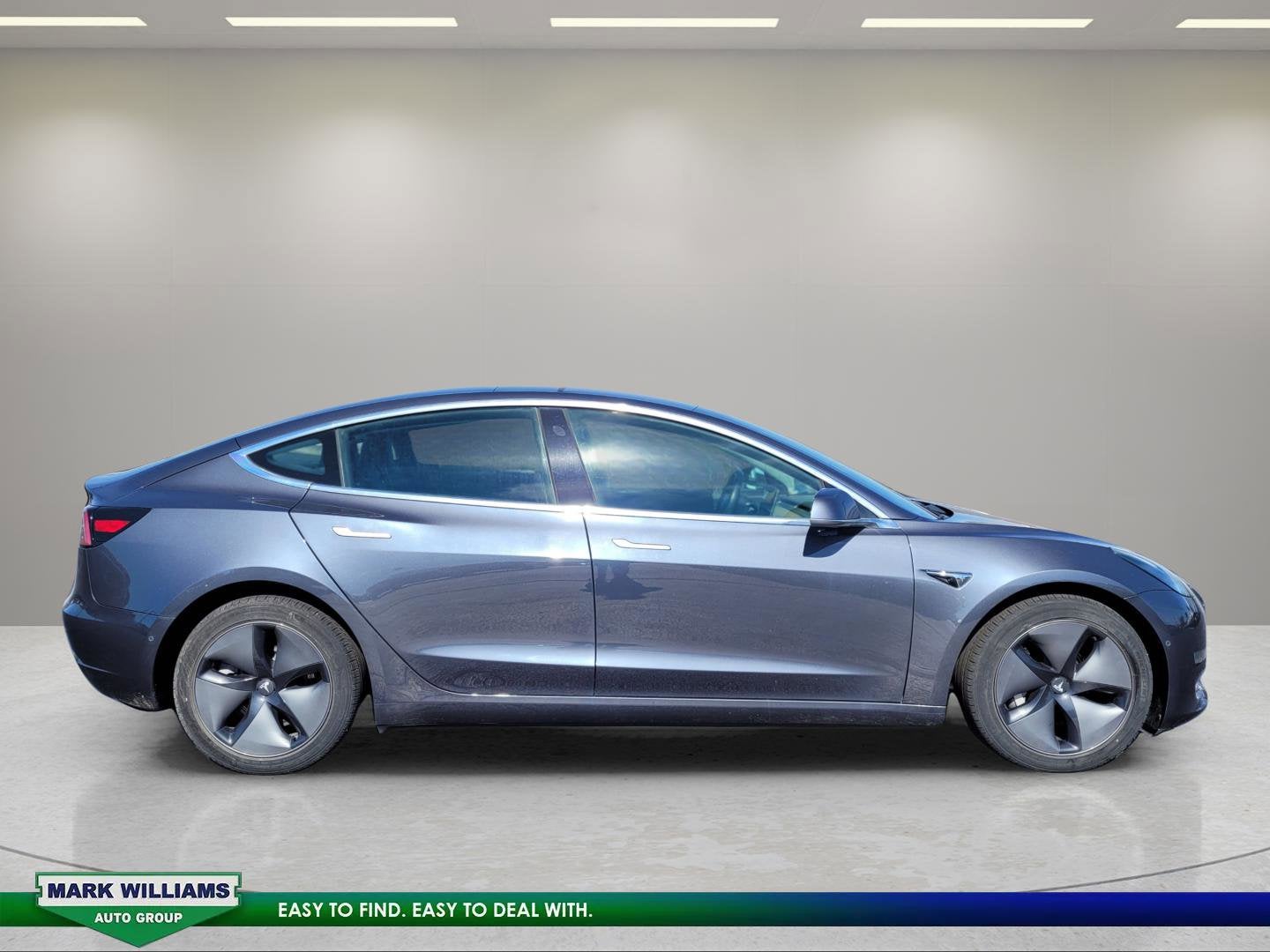 tesla model 3 2018 5YJ3E1EB6JF128602 image tesla model 3 2018 5YJ3E1EB6JF128602 image
